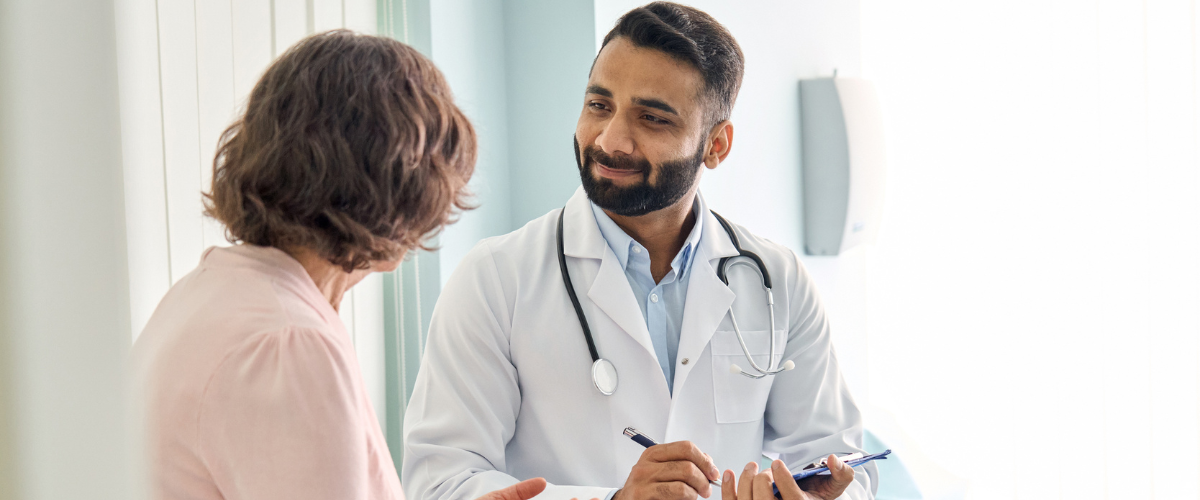 Doctor talking with patient