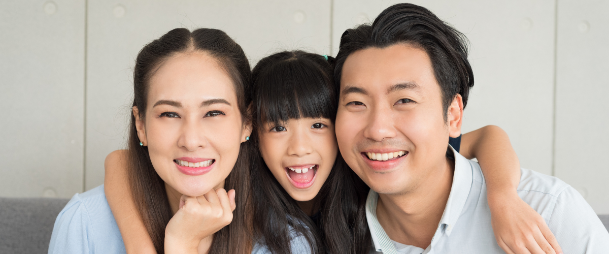Happy family smiling for the camera