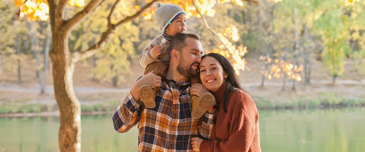 Happy family posing for a photo.